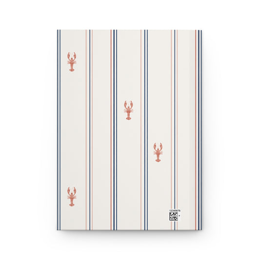 Striped notebook with lobster design on a white background