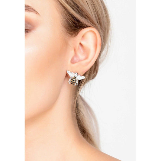 Honey Bee stud earrings in sterling silver worn by a woman, highlighting their delicate and whimsical design