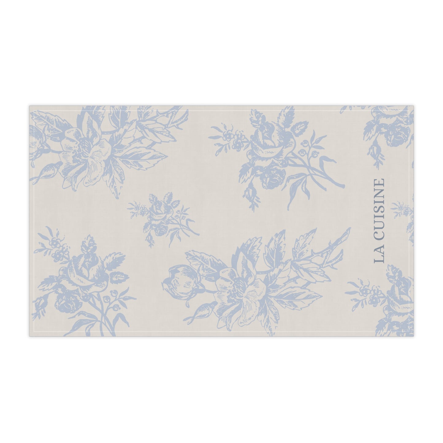 Floral patterned placemat with 'La Cuisine' text on a white background