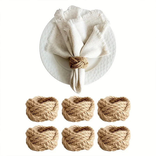 Burlap jute napkin ring styled on plate with linen napkin