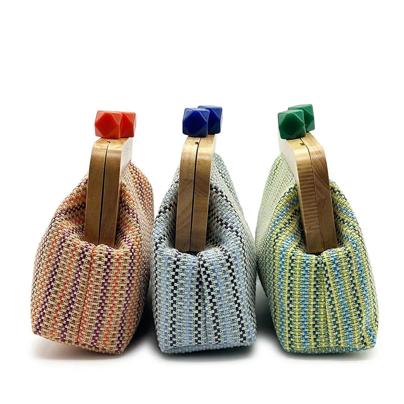 Side view of all three clutches: coral, blue, and green variations