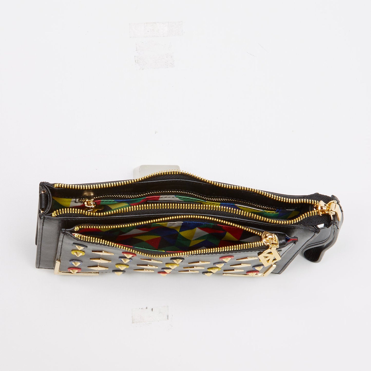 Top view of The Austin clutch showing zippered compartments and multicolor lining