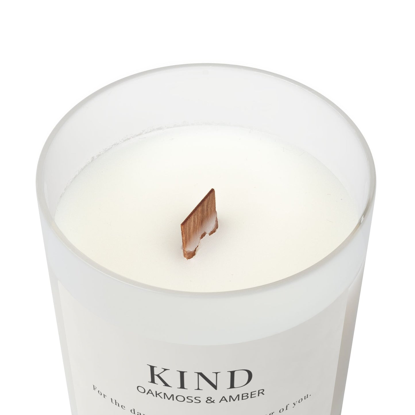 Top of KIND oakmoss and amber candle in frosted glass jar with wooden wick