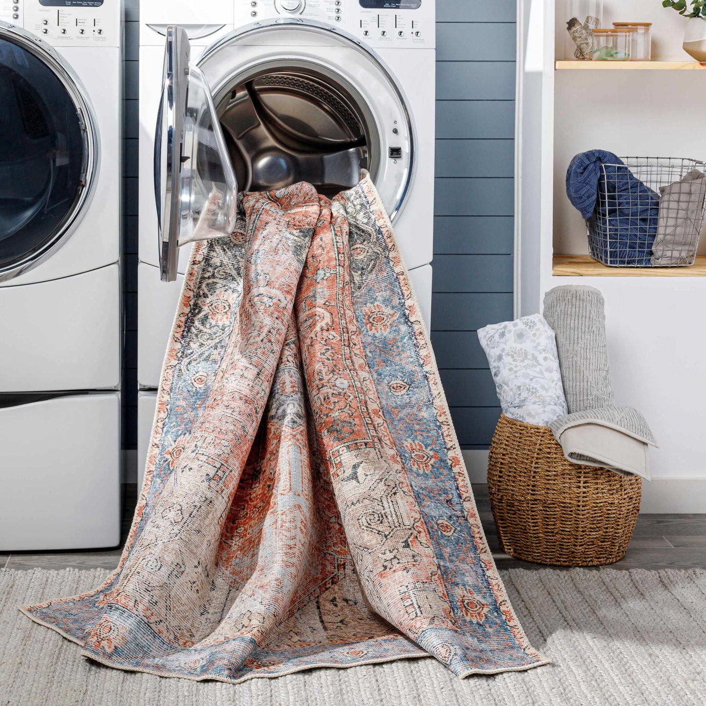 Rug draped over a washing machine in a laundry room.