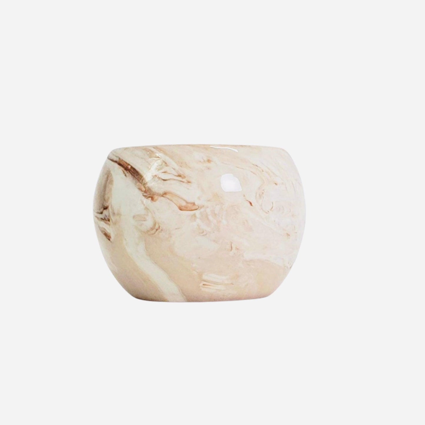 Citrus-scented soy candle in a sand marble holder, made in the USA with organic wax for a clean, long-lasting burn.