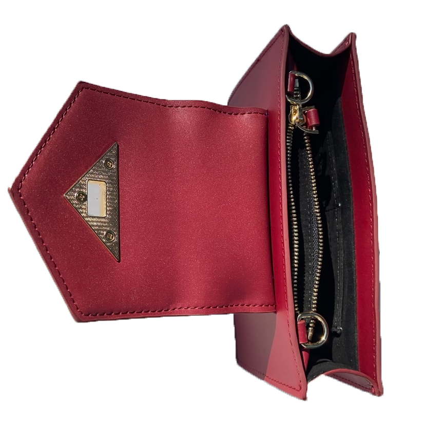 Interior flap detail of the Mary Mini Burgundy Leather Crossbody Bag with zipper pocket and black lining.