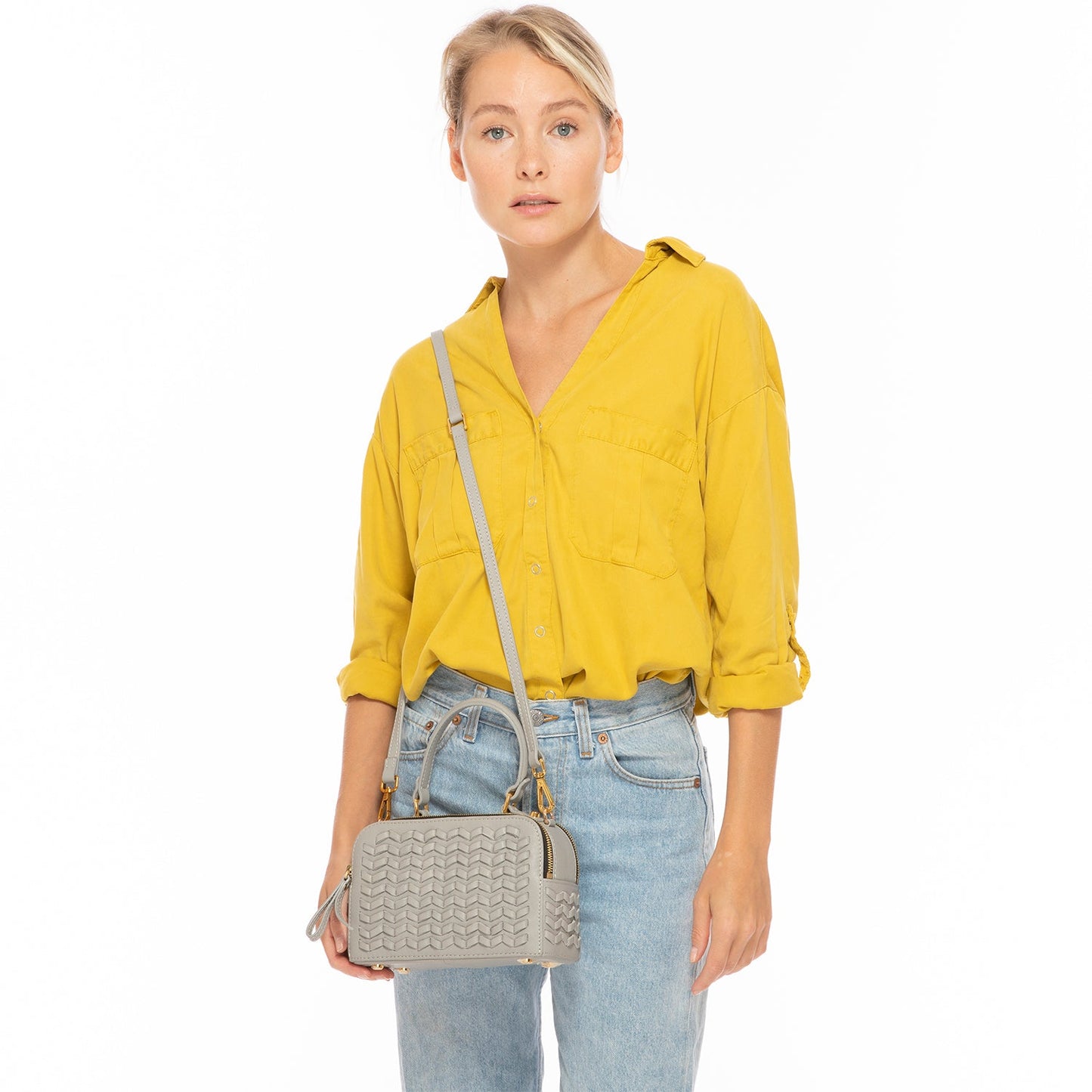 Kayla light gray weave leather crossbody purse styled with outfit