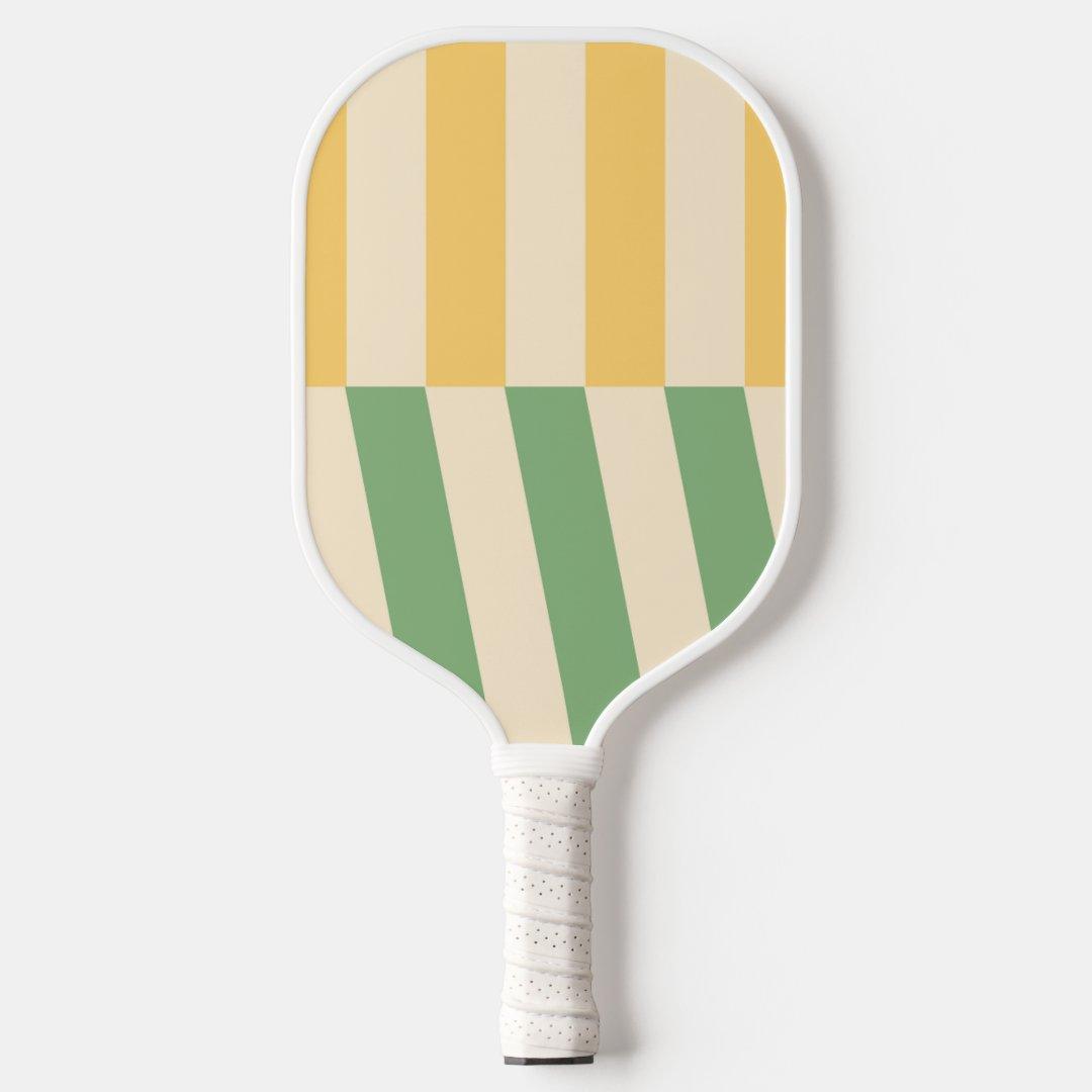 Vintage-inspired yellow and green striped pickleball paddle with ergonomic handle and durable construction, perfect for style and performance.