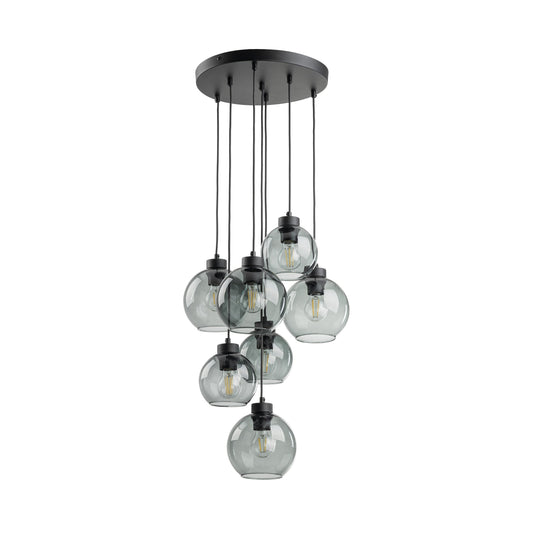 Modern pendant light with clear glass shades and black metal fixture on a white background