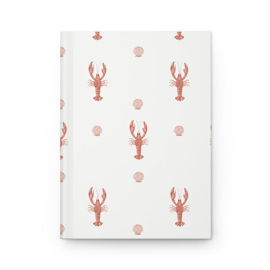 Notebook with lobster and shell pattern on white cover