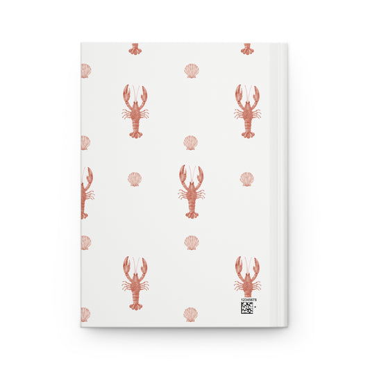 Notebook with lobster and shell pattern on a white background