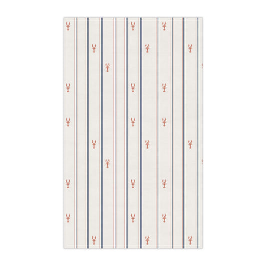 Striped fabric with small red lobster patterns on a cream background