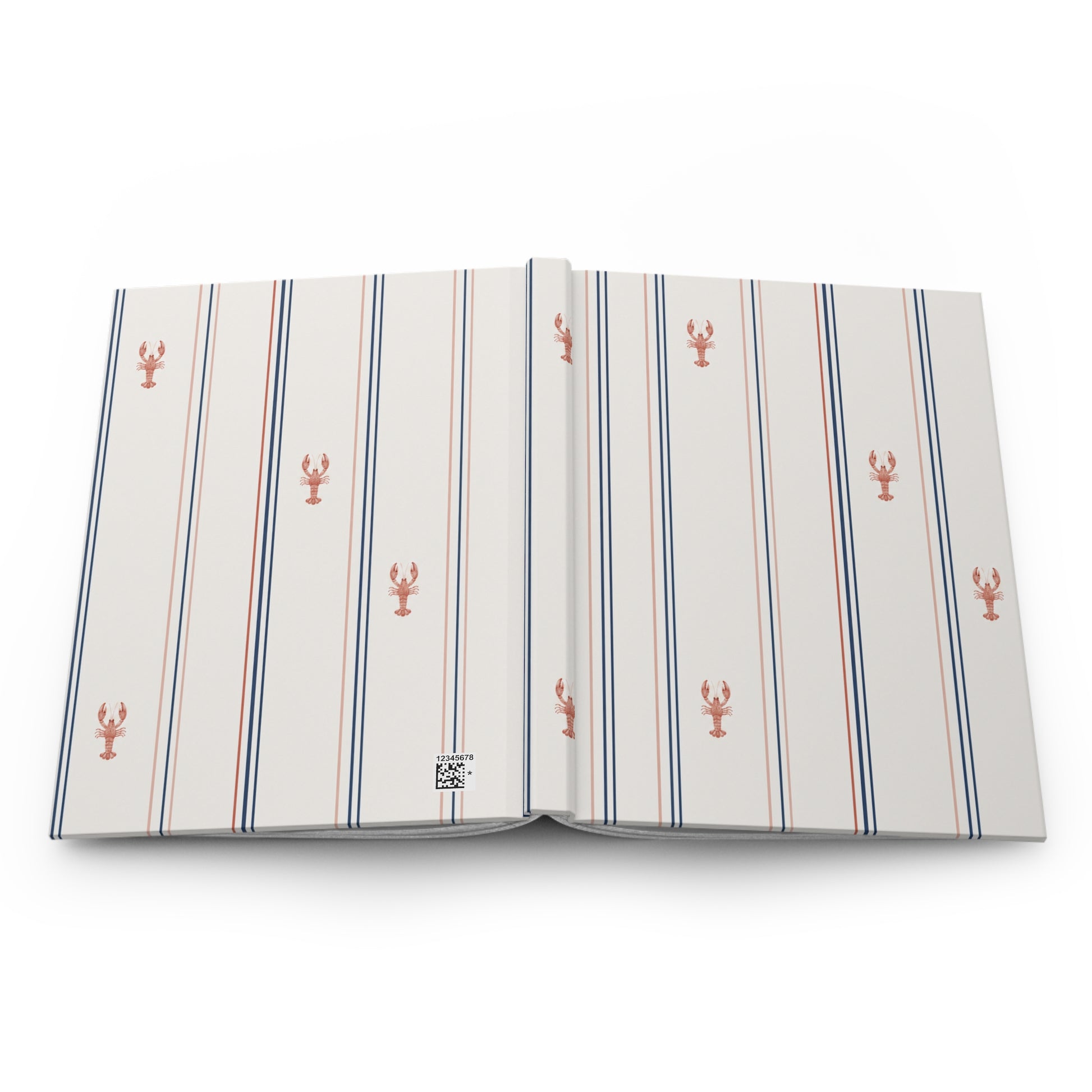 Open notebook with striped pattern and lobster design on a white background