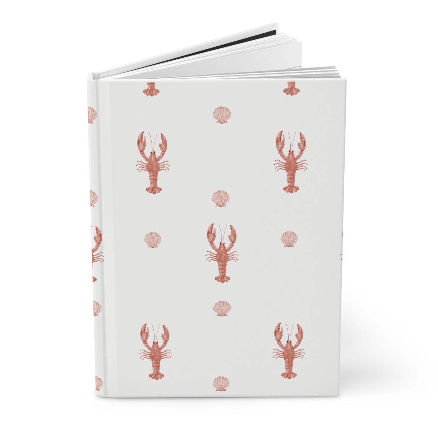 Notebook with red lobster and shell pattern on a white cover