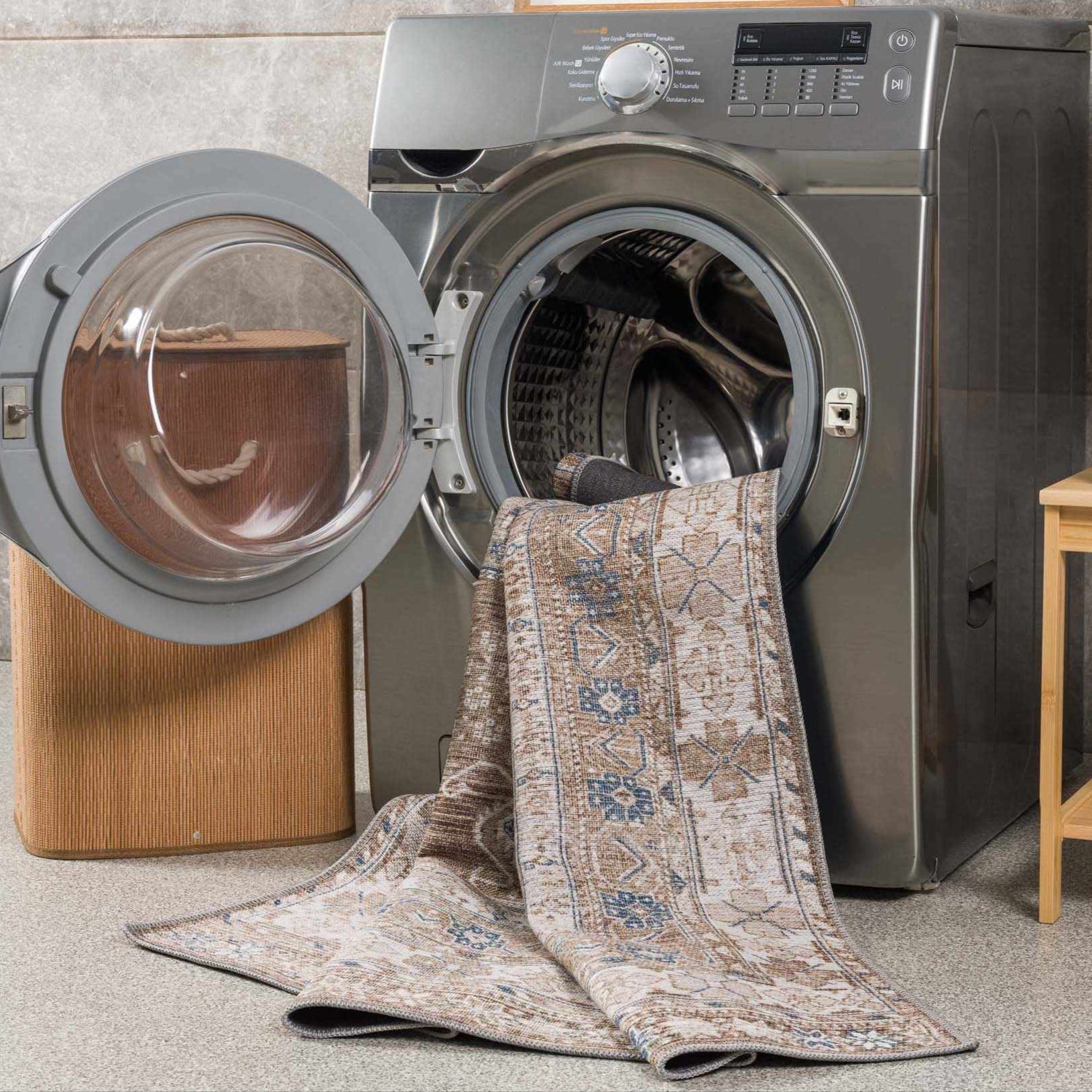 Washable Baltinglass rug being placed into a front-load washing machine
