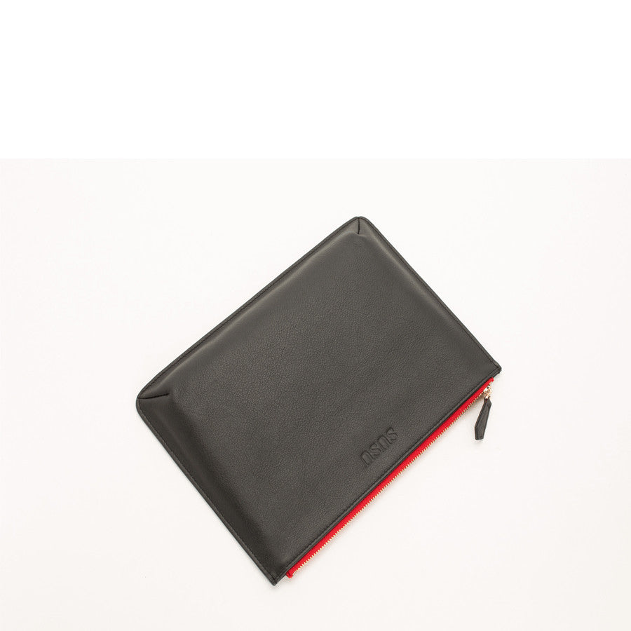 Black zippered pouch with red interior on a white background
