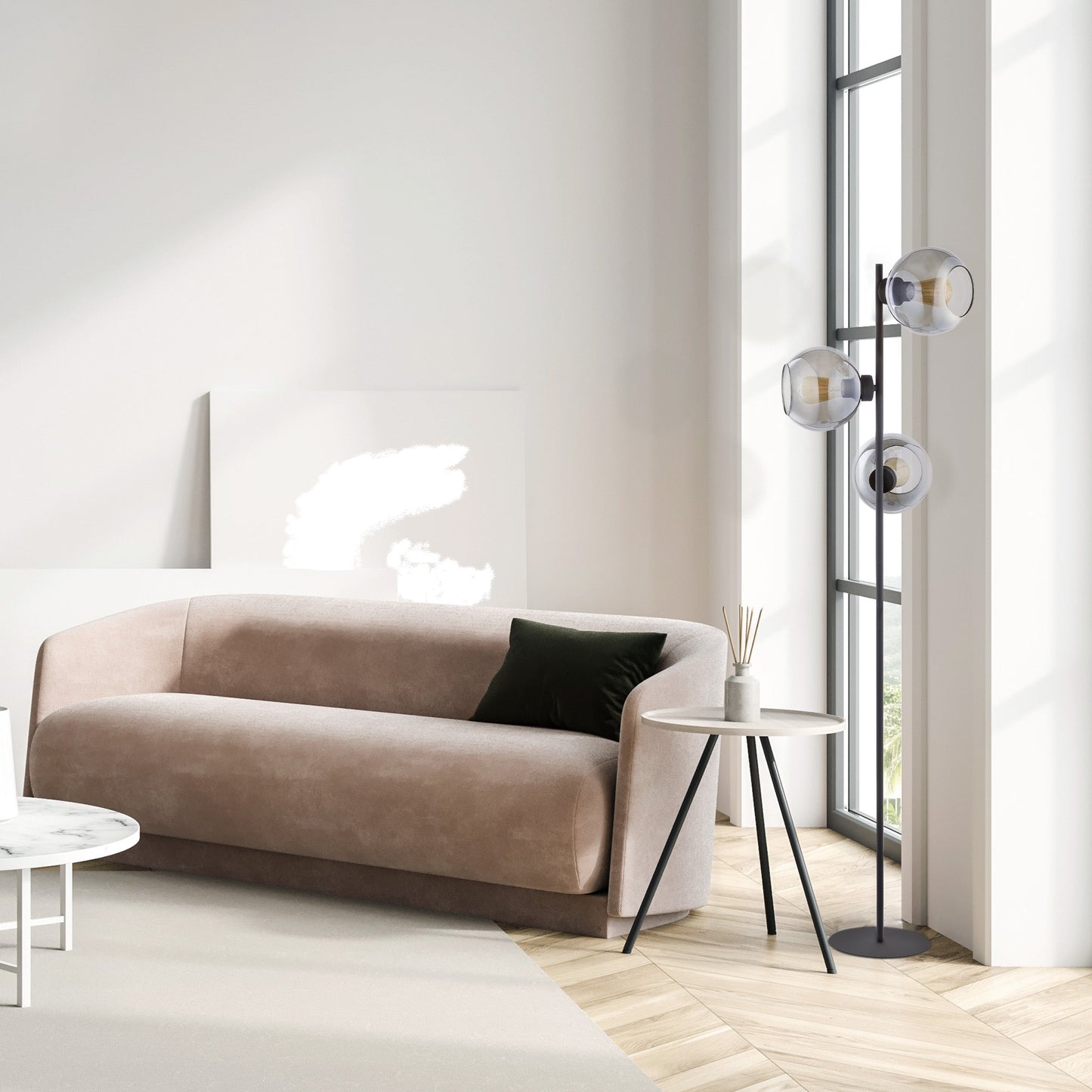 Modern living room with a beige sofa, side table, and floor lamp.