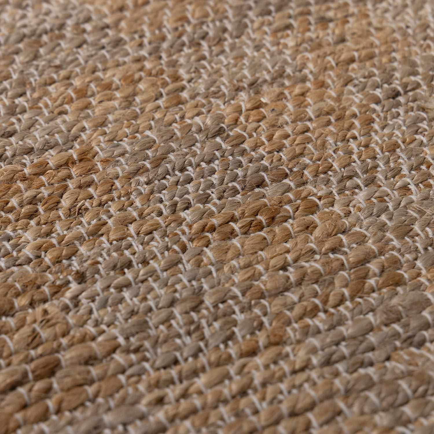 Close-up of a textured brown fabric surface