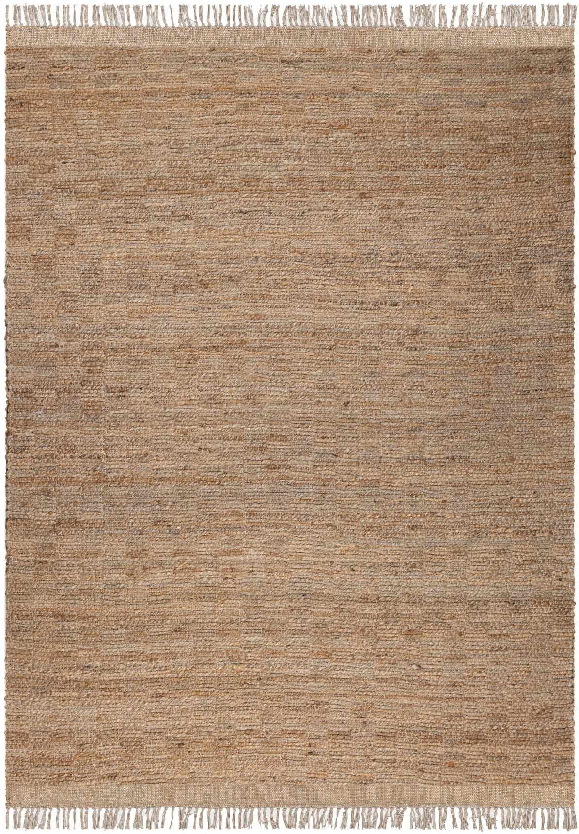 Beige woven rug with white fringe on a plain background