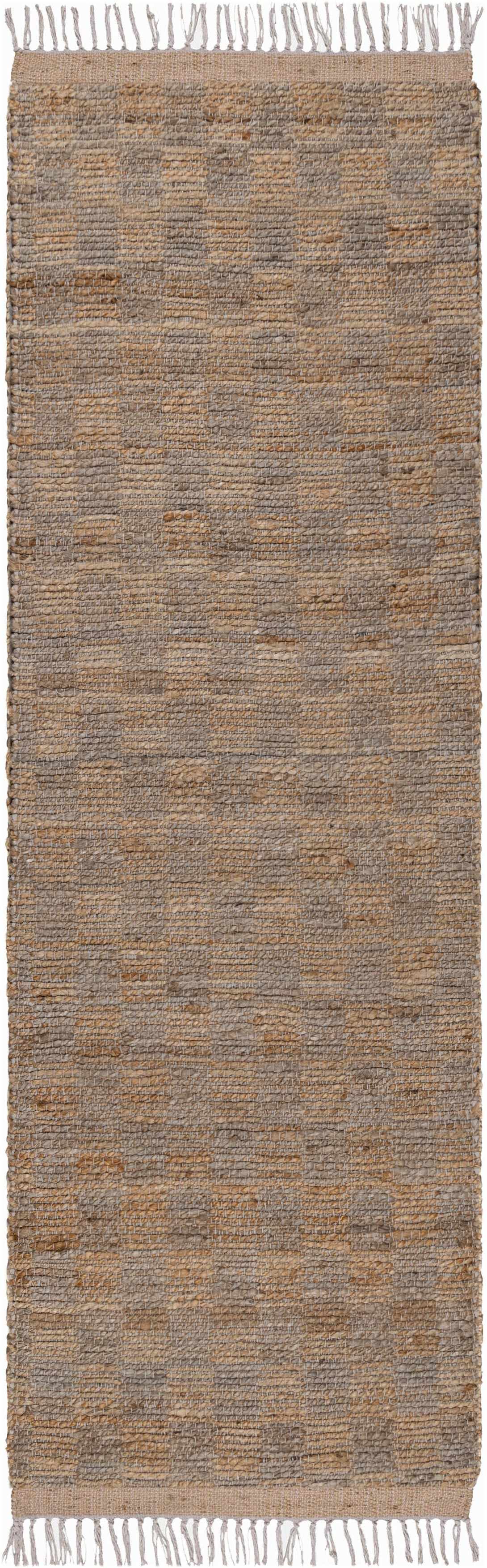 Textured runner rug with a patterned design on a plain background