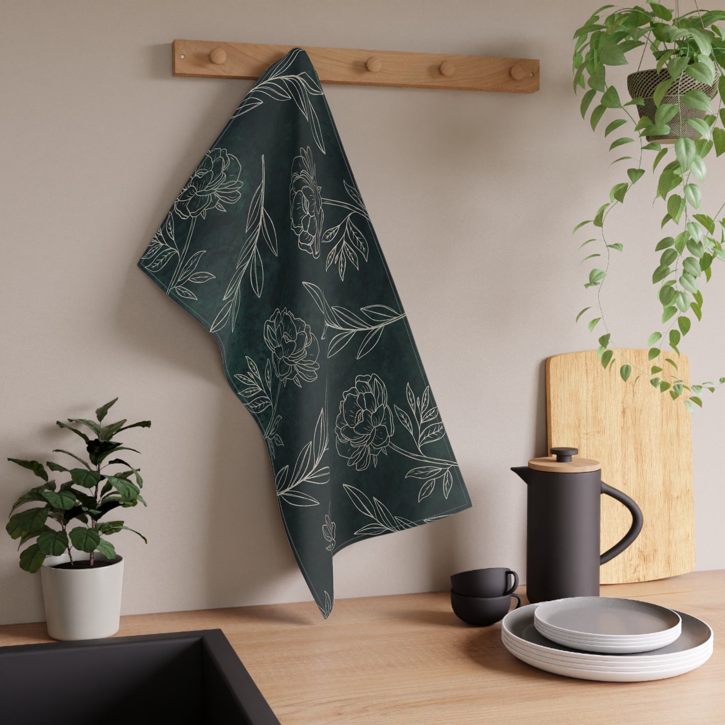Dark green floral tea towel with elegant gold botanical detailing. Made from absorbent cotton or durable polyester twill, perfect for kitchen use and decor.