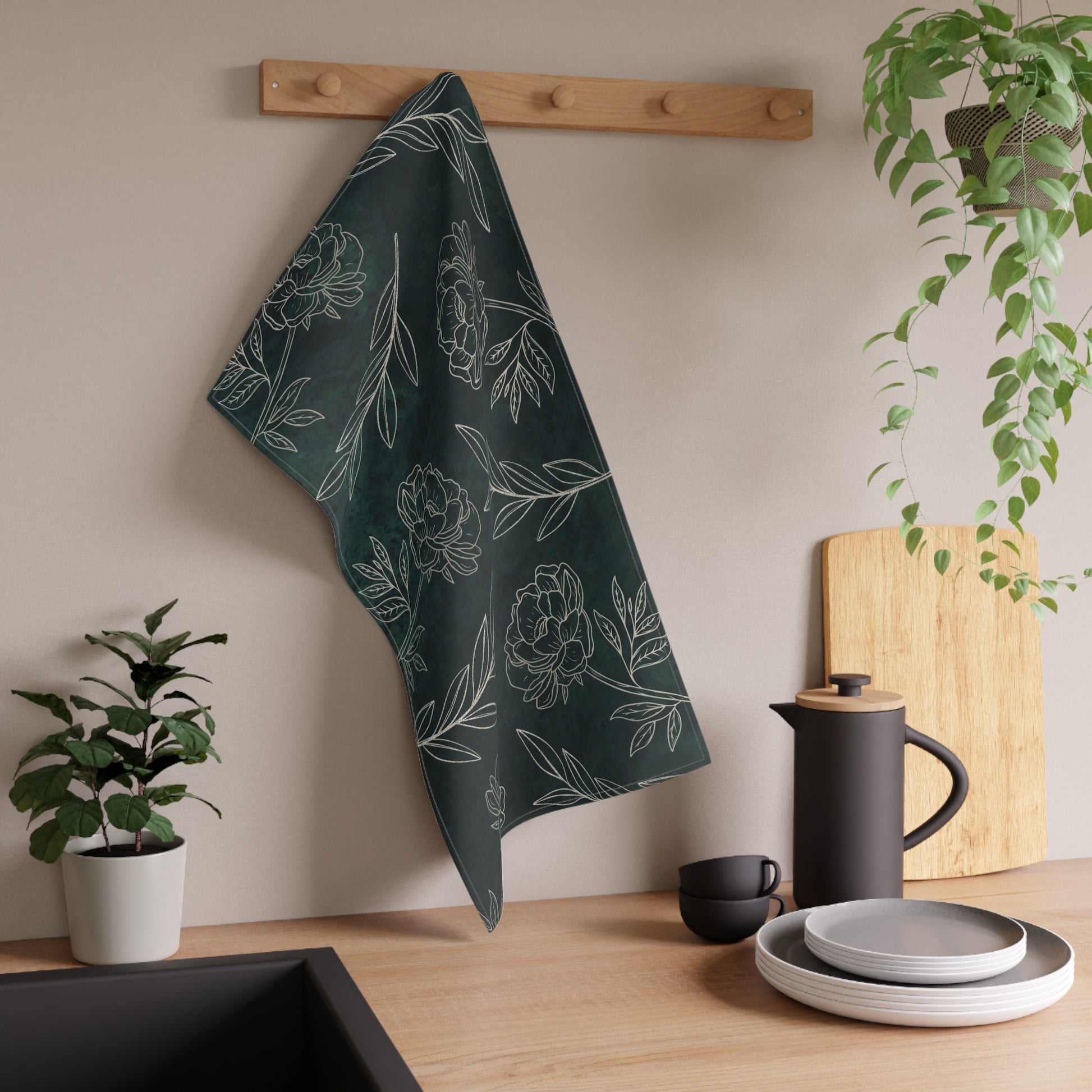 Dark green floral tea towel with elegant gold botanical detailing. Made from absorbent cotton or durable polyester twill, perfect for kitchen use and decor.
