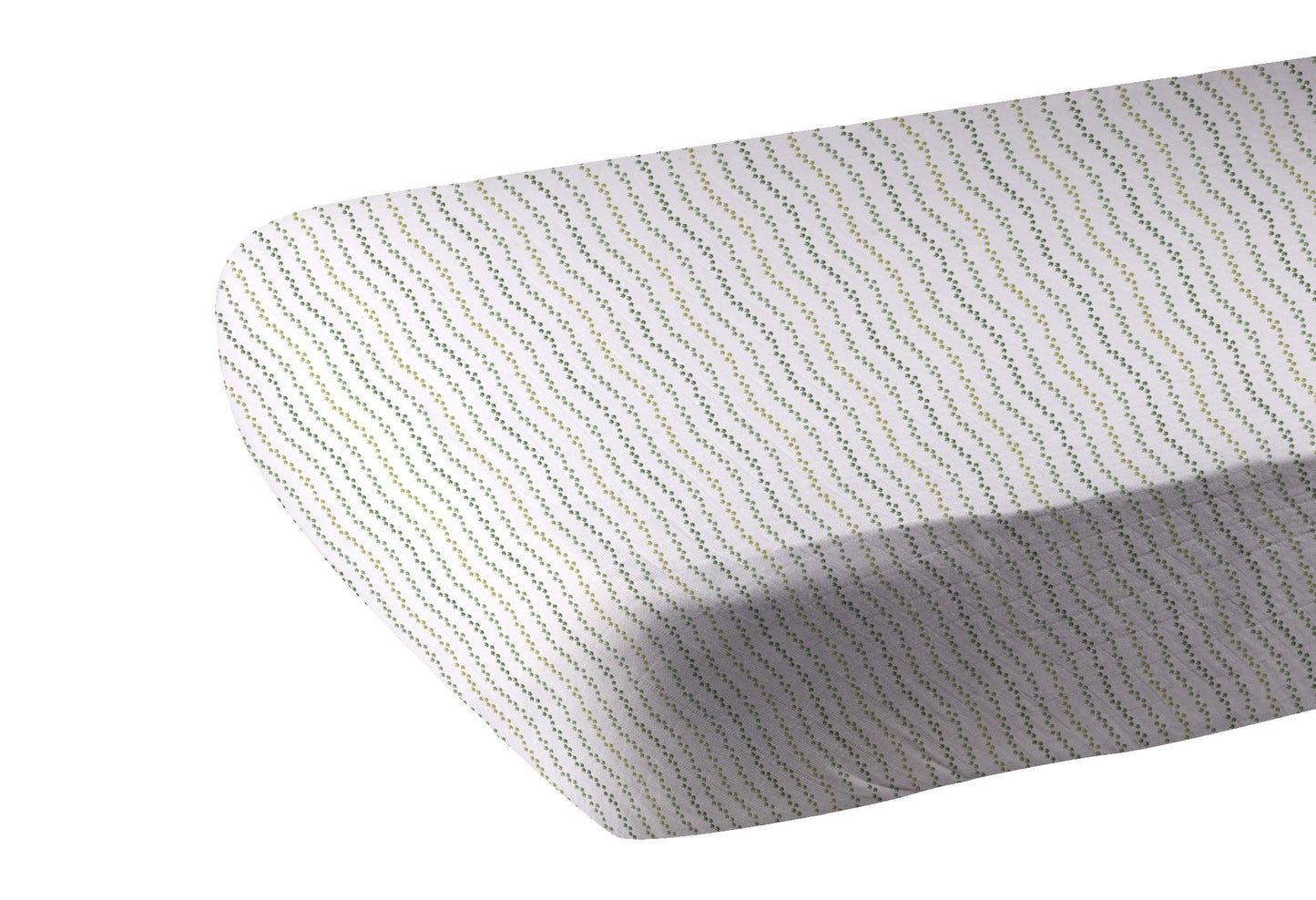 Fitted Dino Feet cotton crib sheet on standard crib mattress