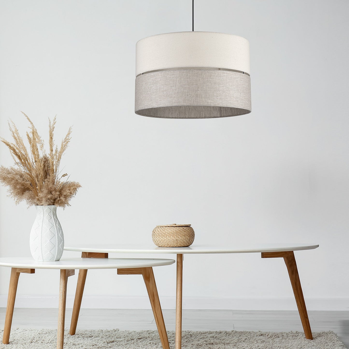 ECO pendant light hanging over wood table

