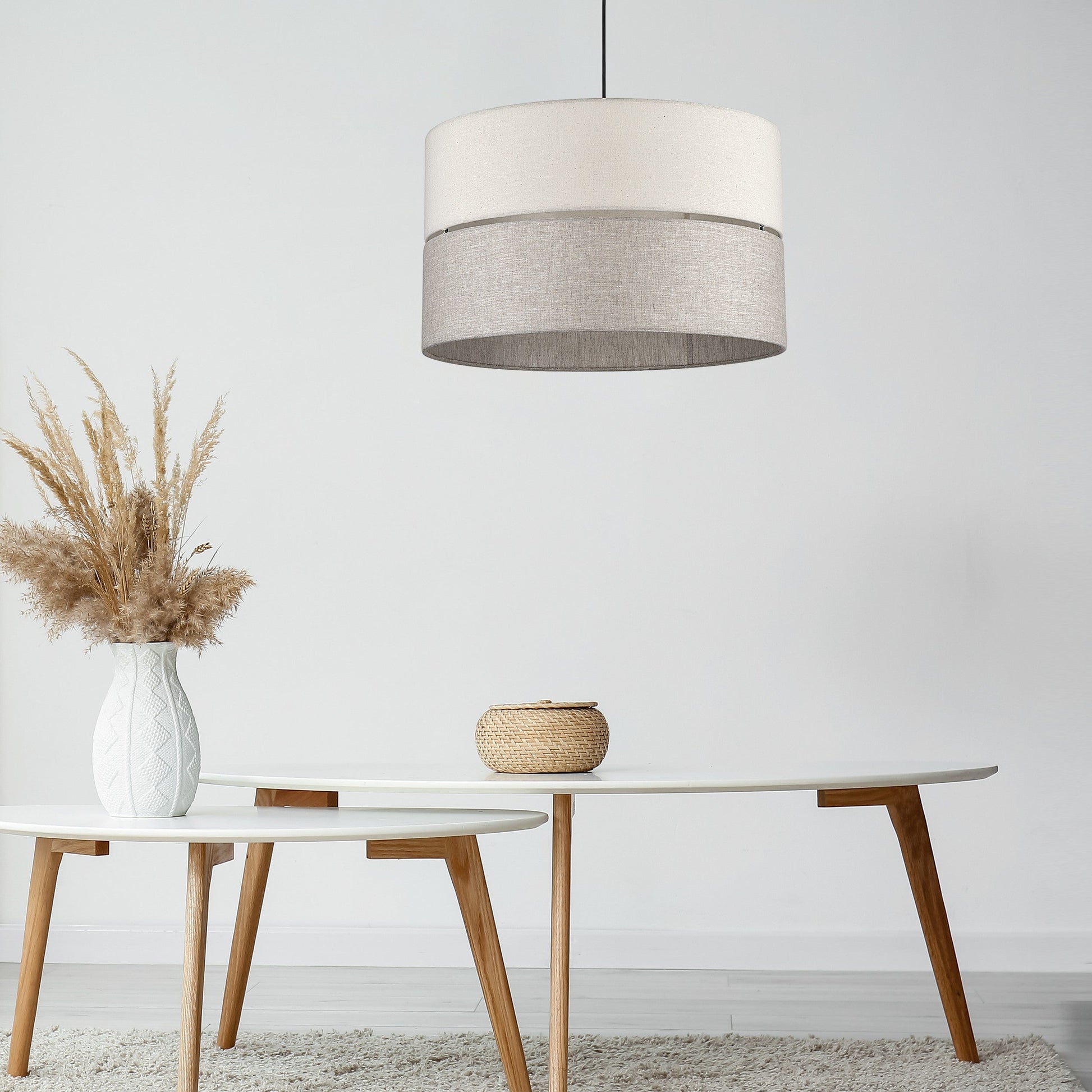 ECO pendant light hanging over wood table

