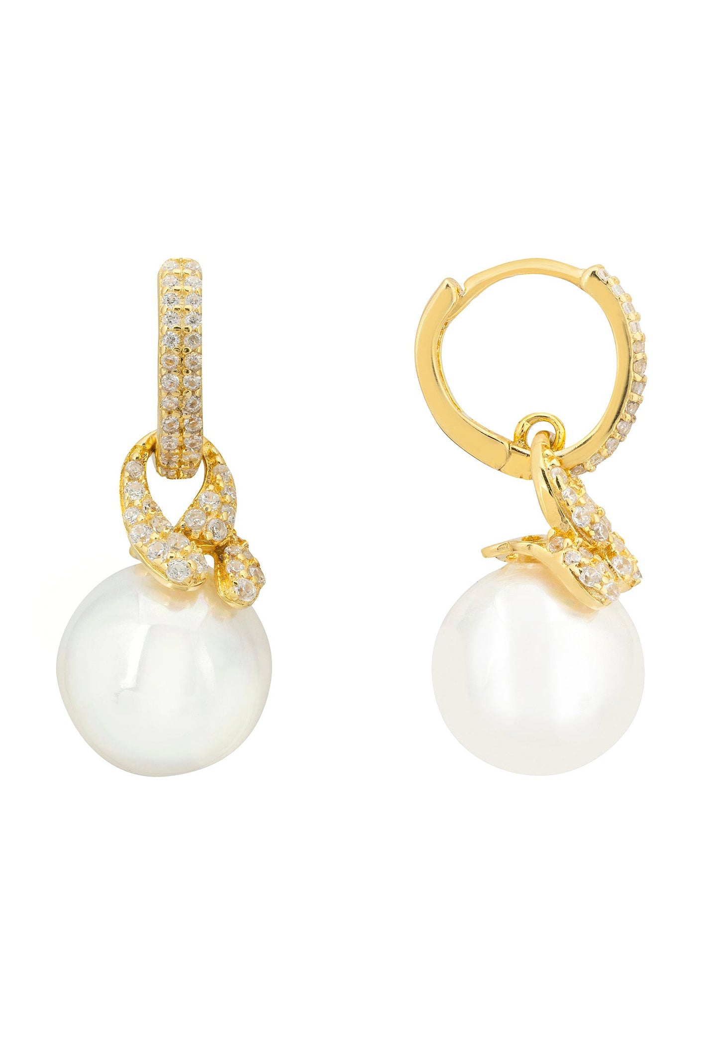 Gold hoop earrings with pearl drops on a white background