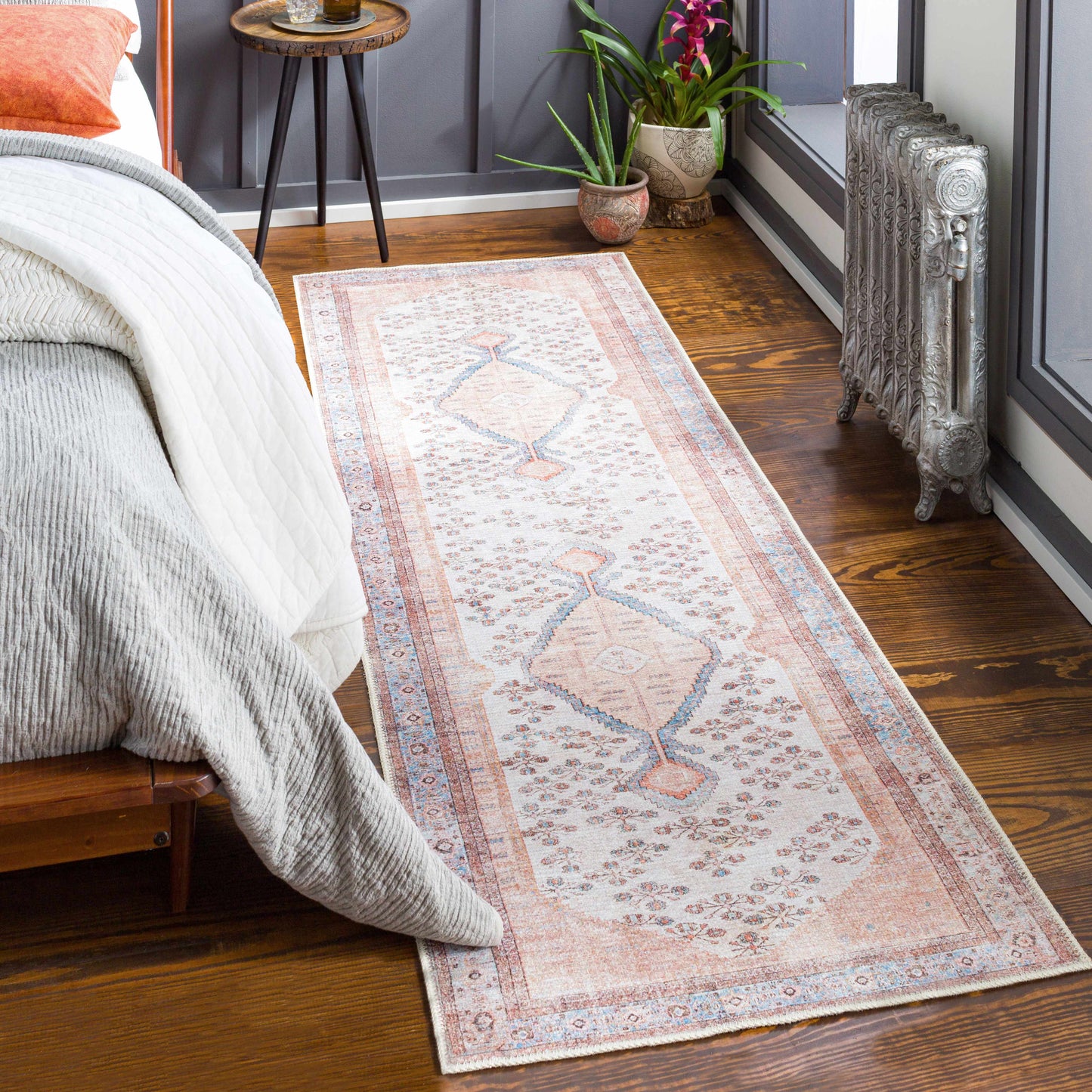 Moora washable runner rug in bedroom beside wooden bed frame