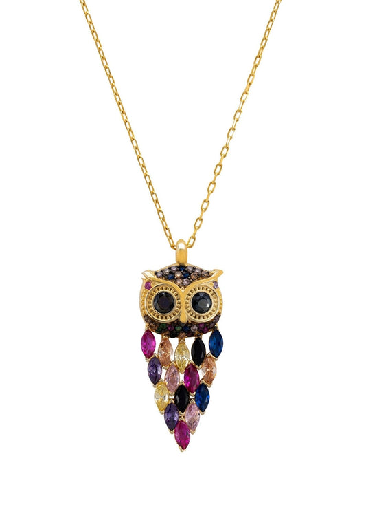 Gold owl-shaped necklace with colorful gemstones on a white background