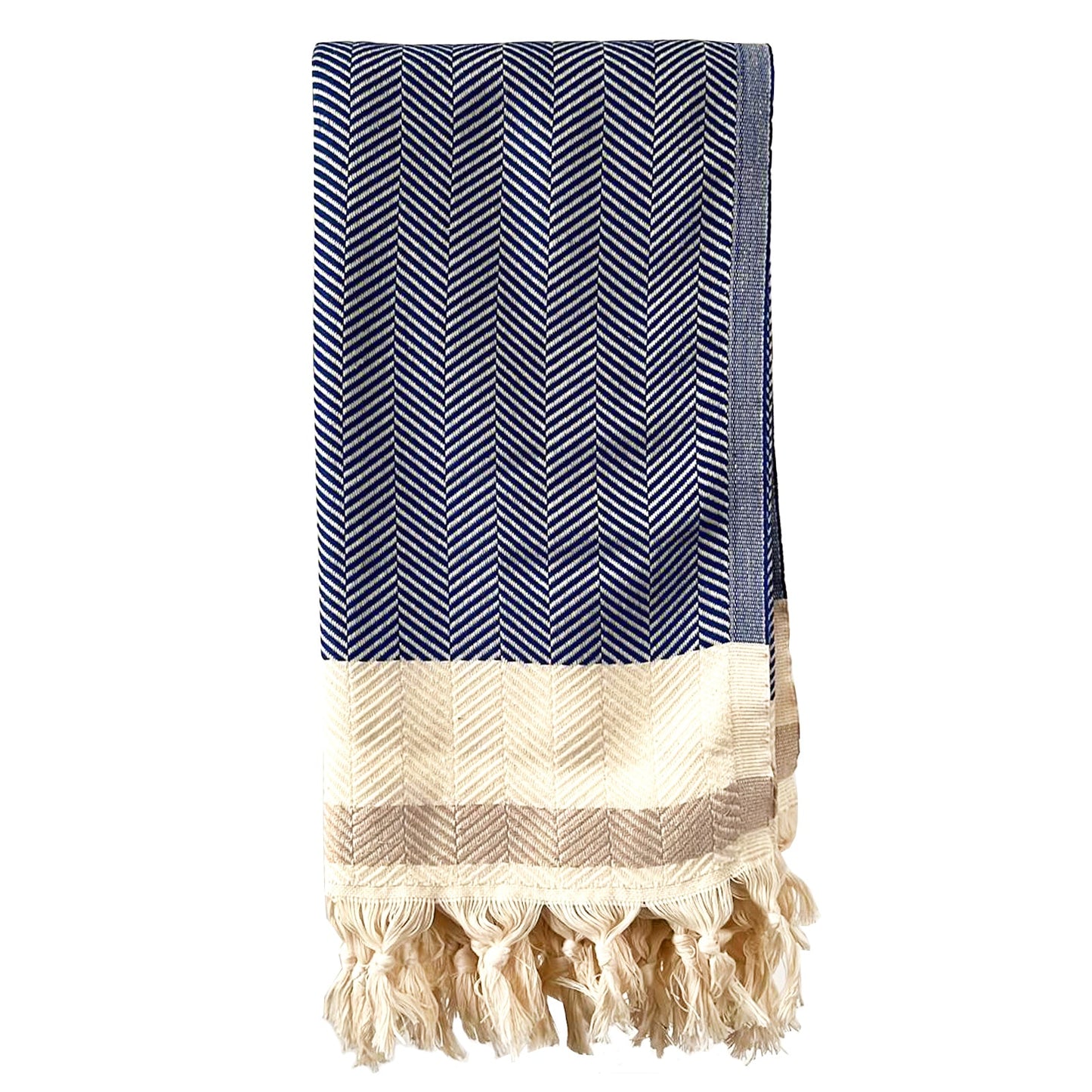 Navy and cream hand-loomed cotton throw blanket with tassels, folded