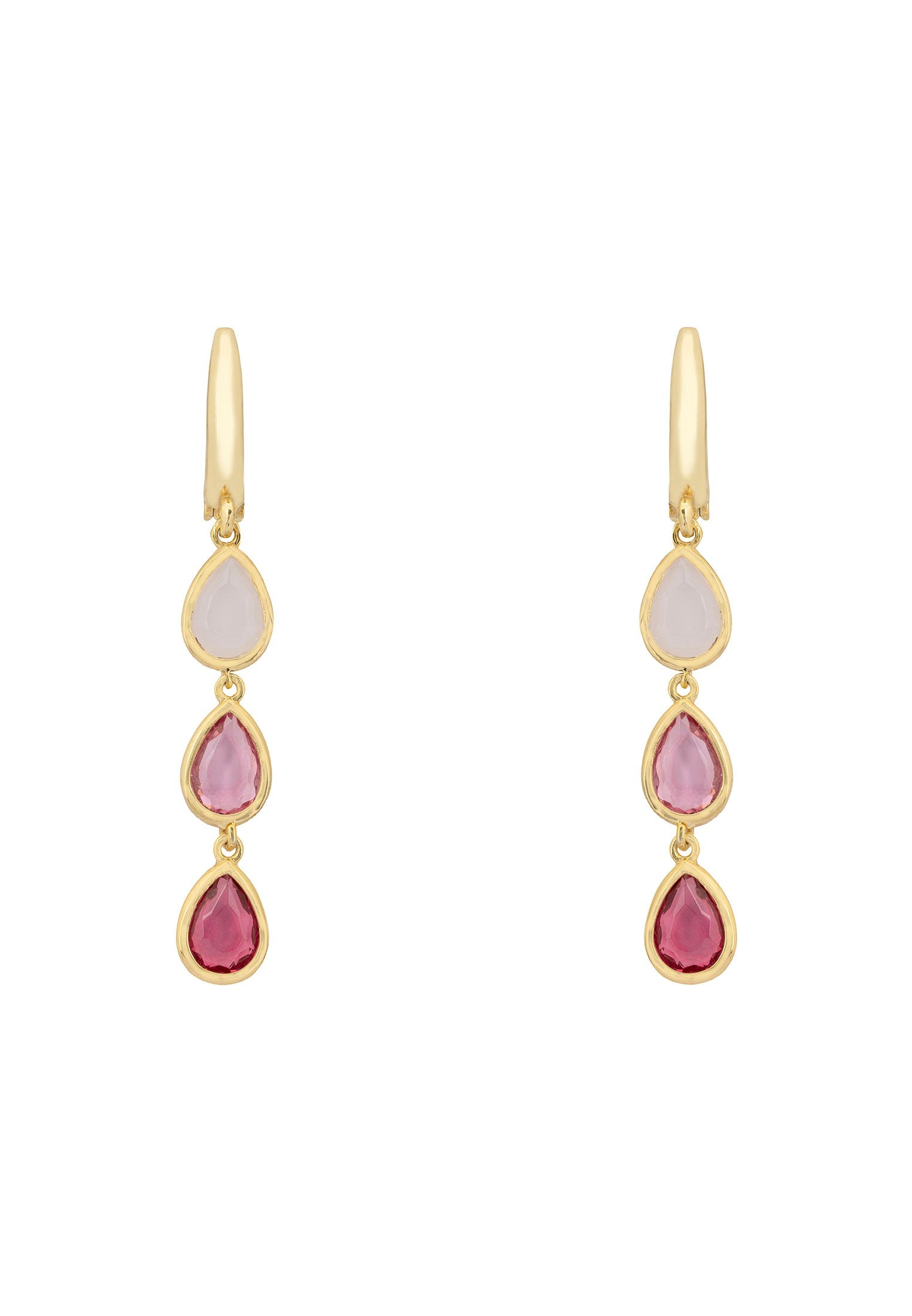 Gold earrings with pink and red gemstones on a white background