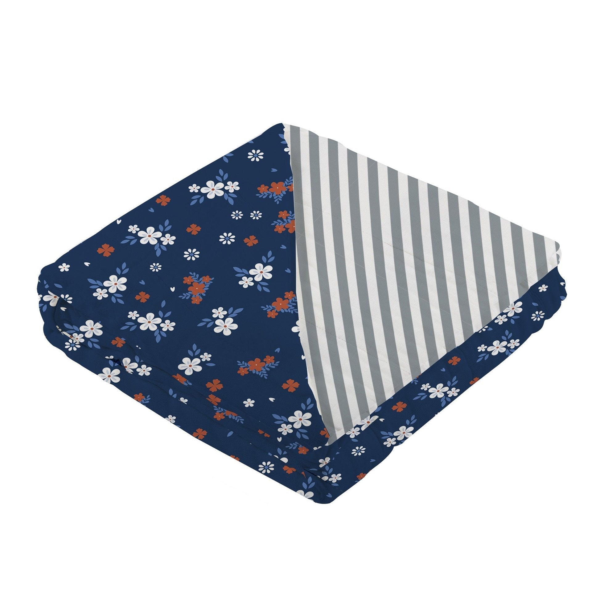 Folded baby blanket with floral and striped patterns on a white background
