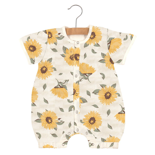 Bamboo baby romper in sunflower print with front and bottom snaps, short sleeves, and relaxed fit