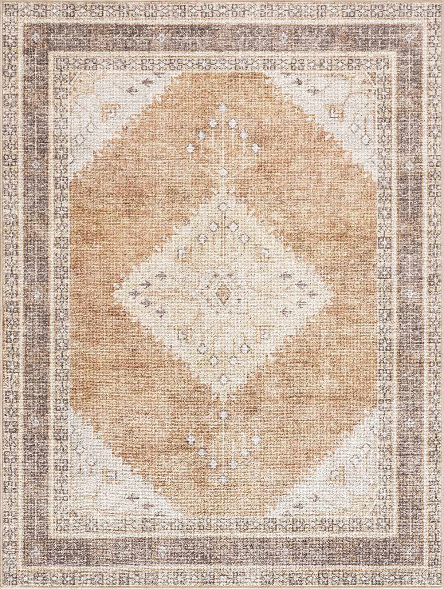 Brown and cream medallion washable area rug with detailed pattern.