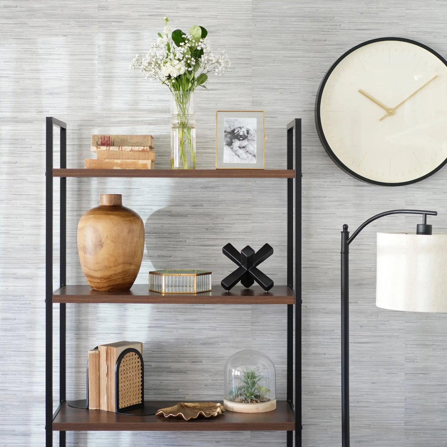 Styled wood vase on shelf with neutral decor


