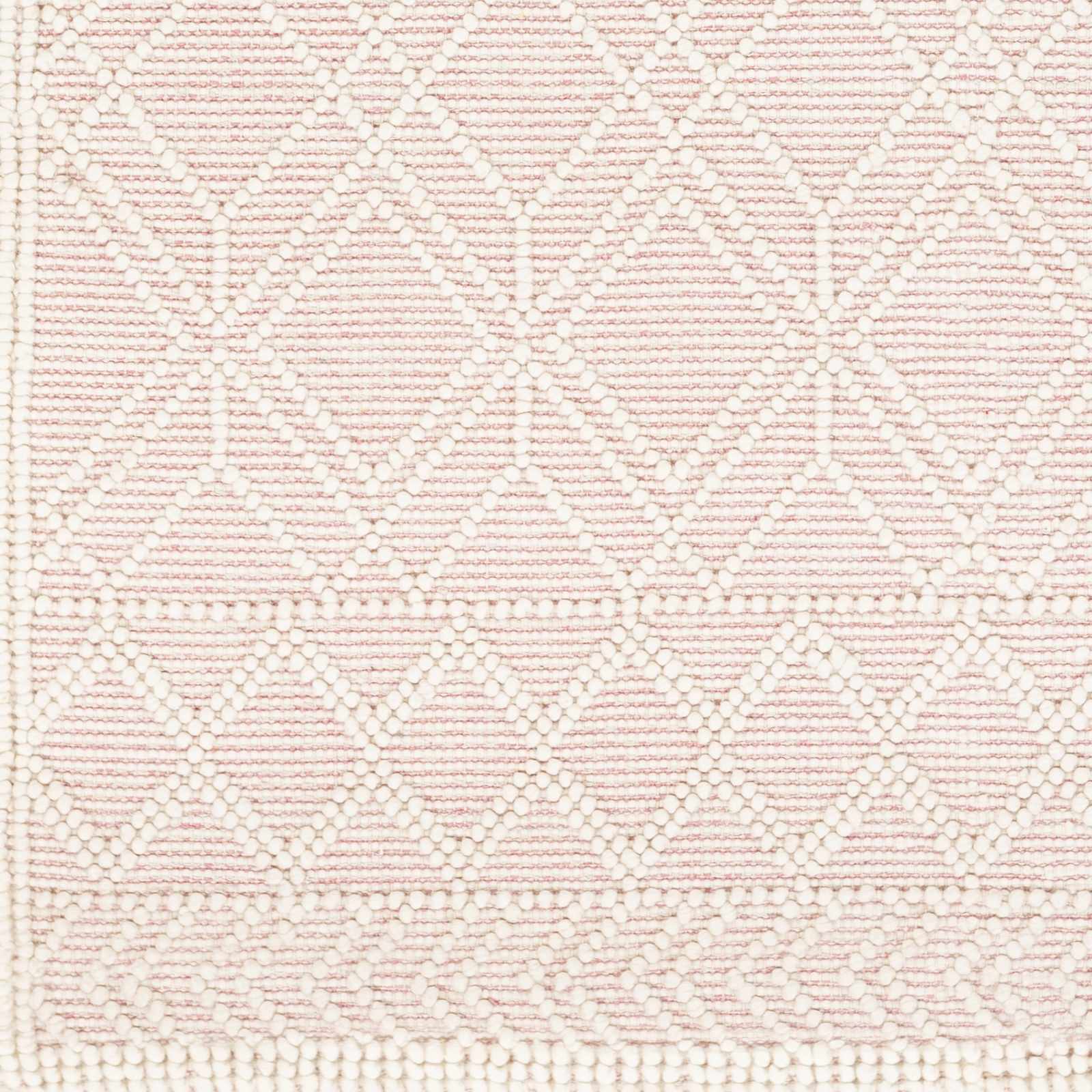 Textured pink and white patterned fabric swatch
