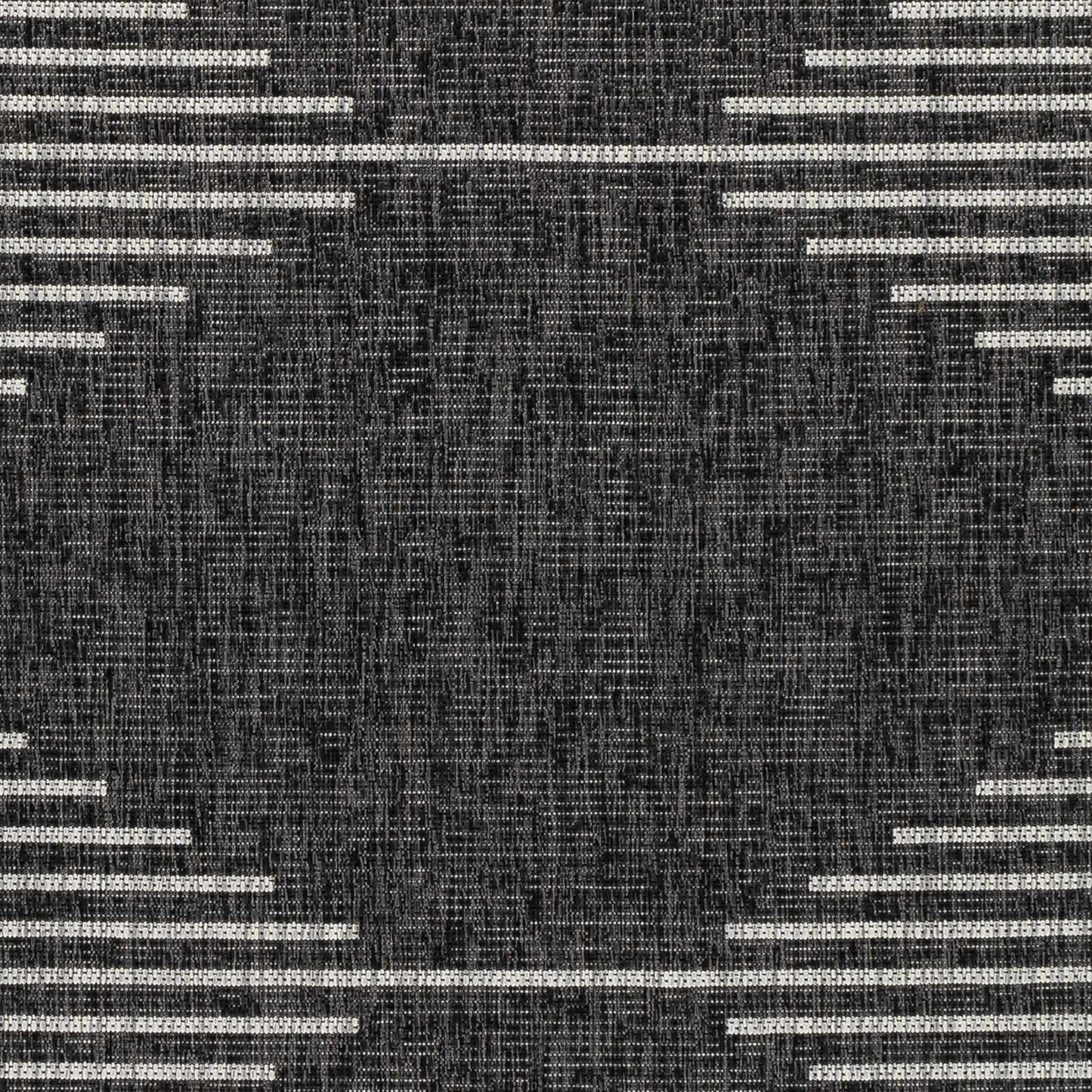 Textured black and white pattern with geometric shapes