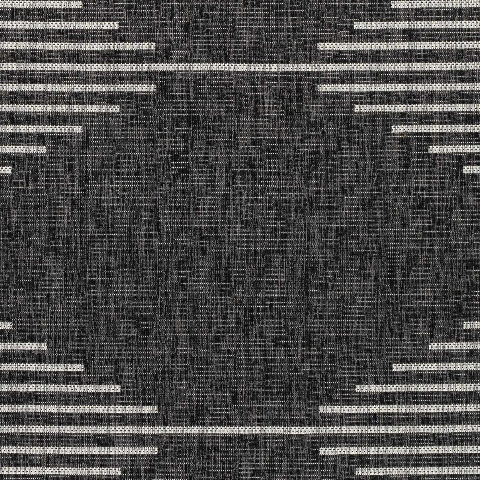 Textured black and white pattern with geometric shapes
