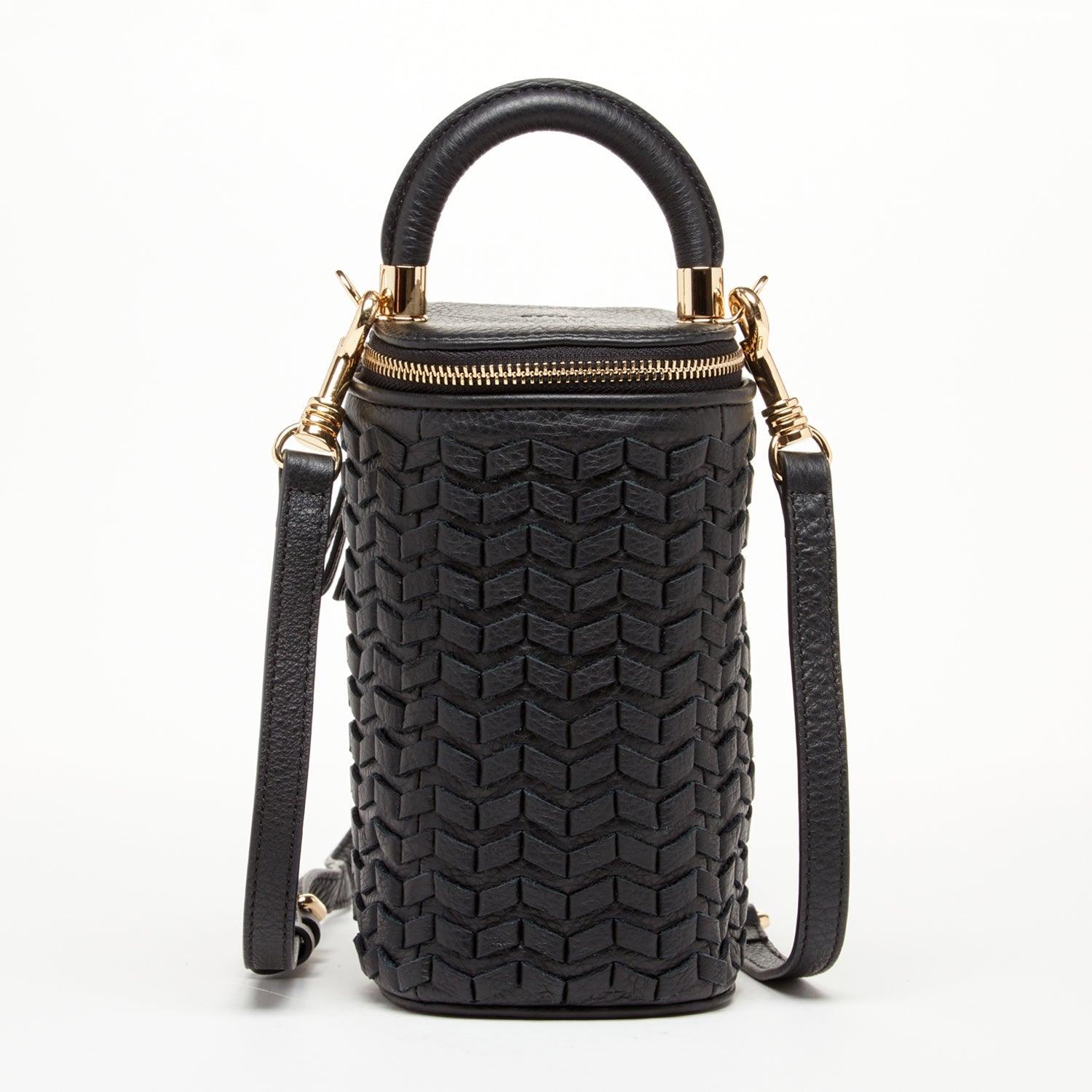 Black basket weave leather crossbody bag by SUSU, featuring Italian soft leather, gold hardware, adjustable strap, and teal-lined interior.