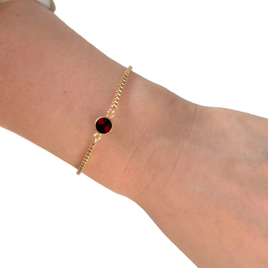 Garnet bracelet with goldfilled chain worn on wrist