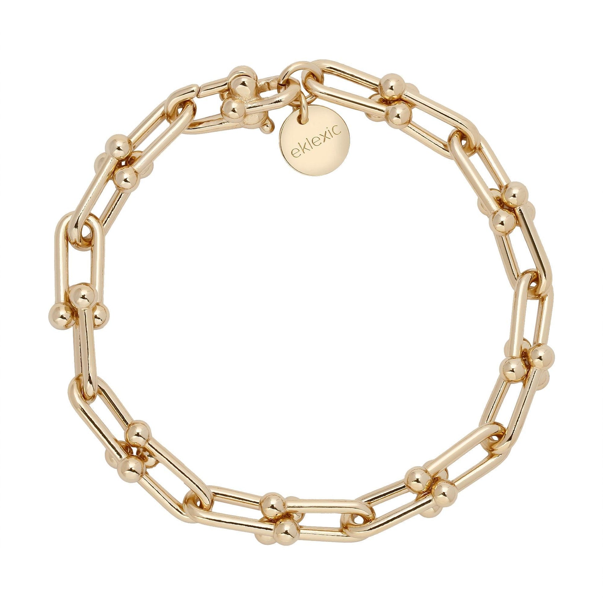Handmade U-Link bracelet in 10K Gold or Rhodium-Silver, featuring a custom clasp and tarnish-resistant finish. Sustainable, stylish, and versatile.