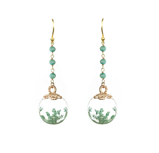 Front view of petrified flower drop earrings with amazonite beads