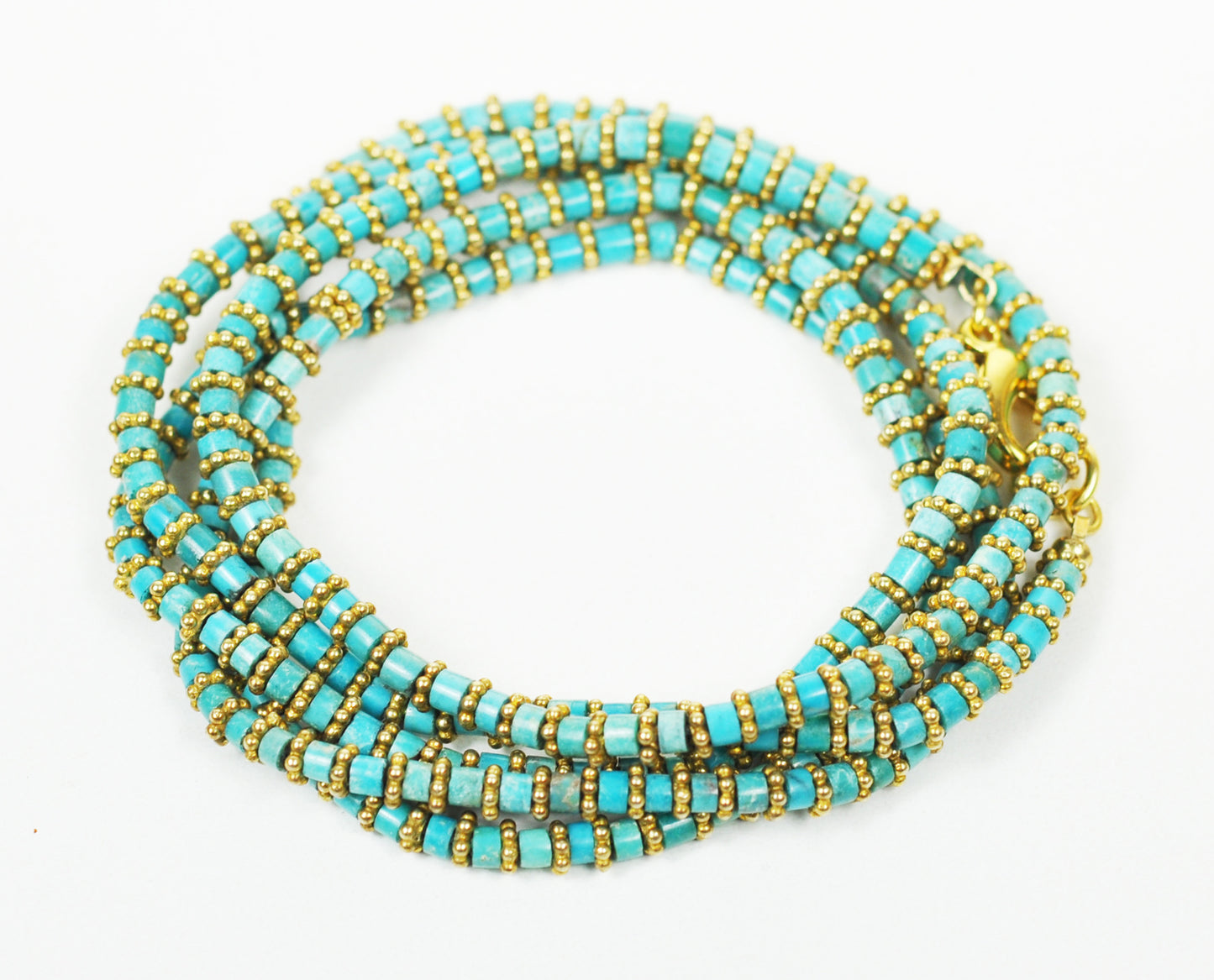 Turquoise wrap bracelet shown coiled in full 33-inch length