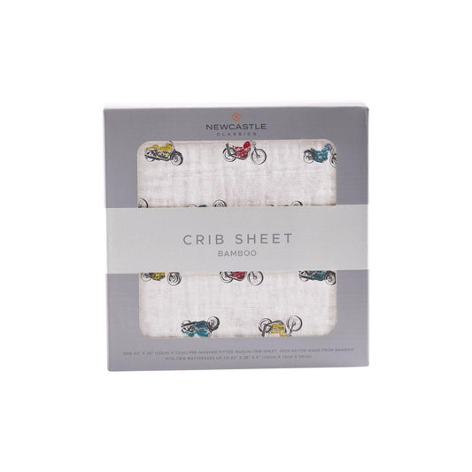 Vintage motorcycle-themed bamboo muslin crib sheet, designed for a breathable, soft, and playful addition to your baby’s nursery.